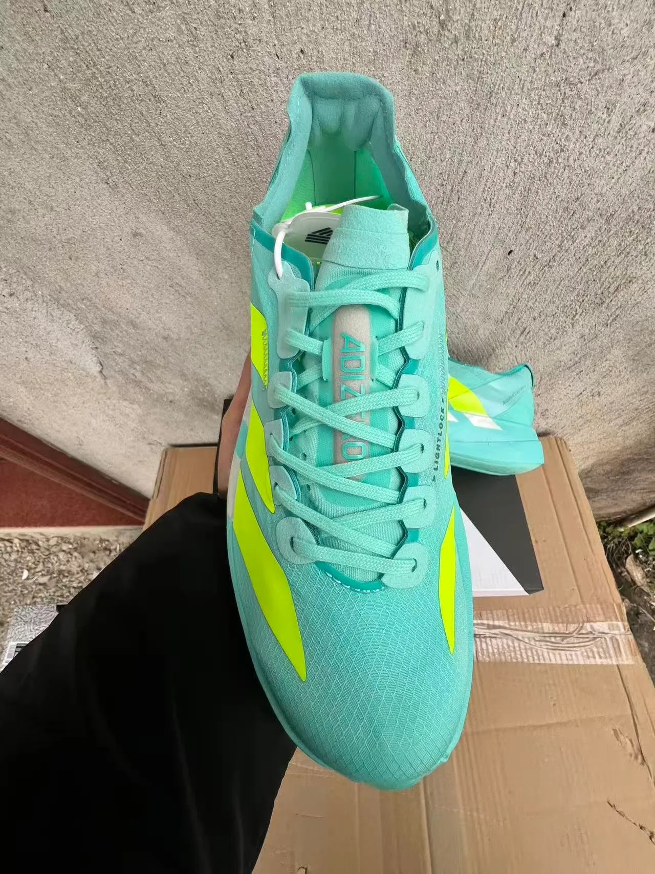 Adidas Adizero Adios Pro 4 Lightstrike Pro Cyan Neon Yellow zapatillas de running 3