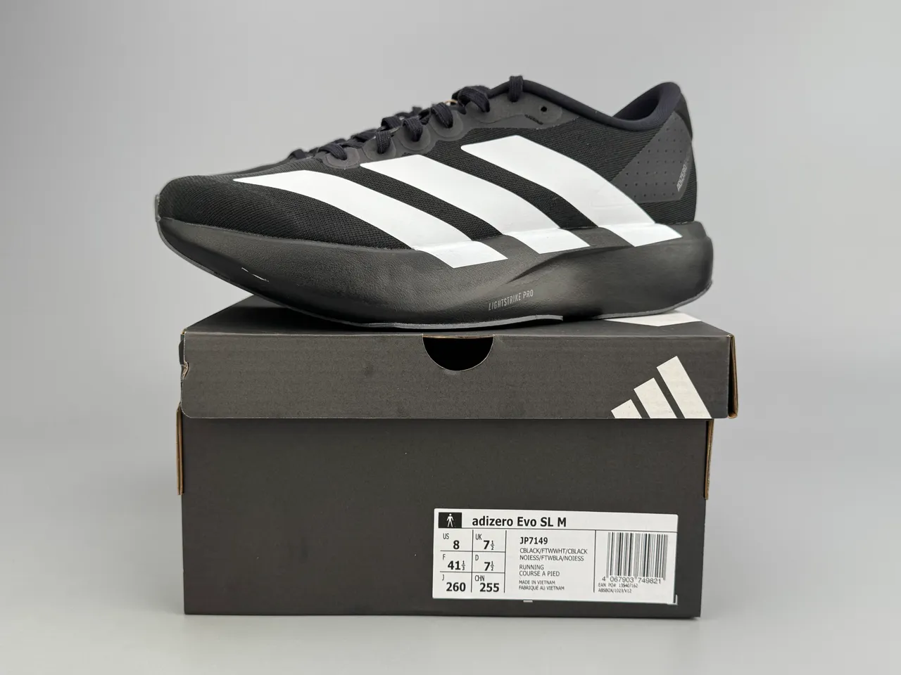 Adidas Adizero Evo SL Tênis de corrida pretos e brancos 4