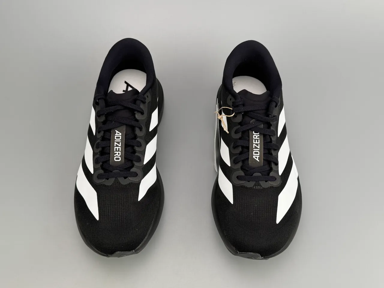 Adidas Adizero Evo SL Tênis de corrida pretos e brancos 9
