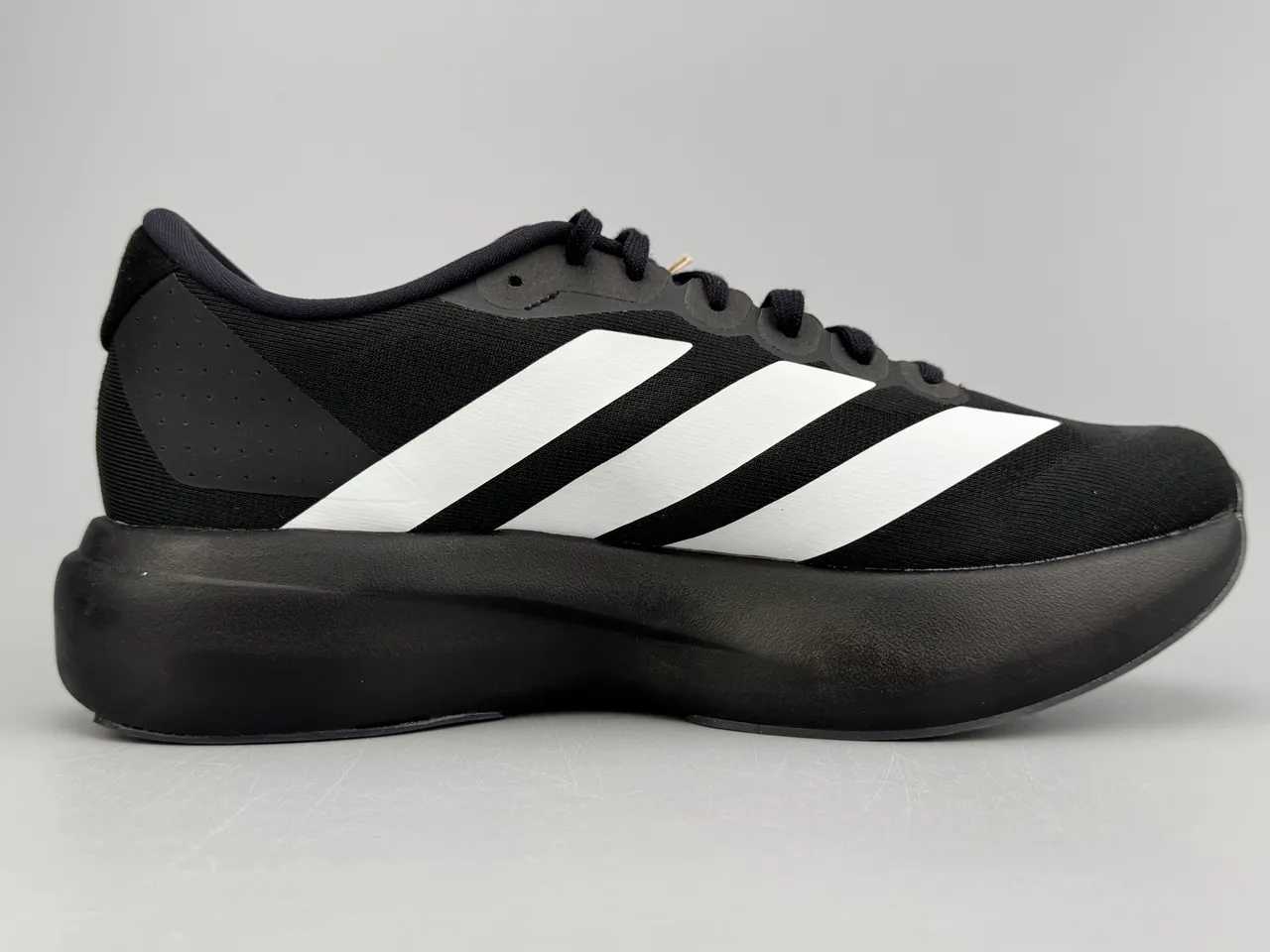 Adidas Adizero Evo SL Tênis de corrida pretos e brancos 10