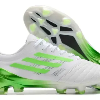 Adidas Botas de fútbol blancas y verdes low-cut con tacas moldadas y placa translúcida para césped firme