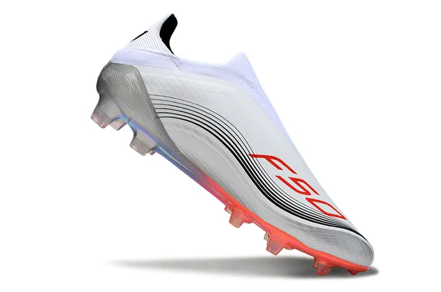 Adidas Zapatos de fútbol blancos rojos de corte bajo con ajuste de calcetín suela iridiscente para terreno firme 2