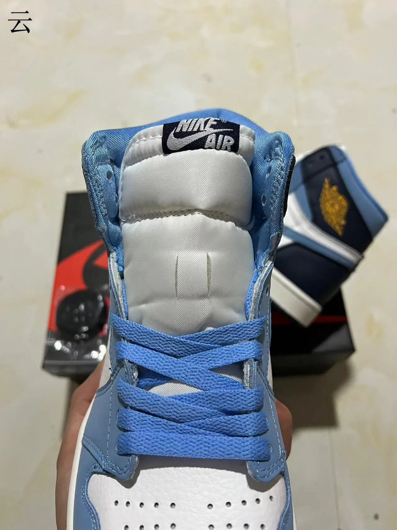 Zapatillas de baloncesto Air Jordan 1 de caña alta en cuero y revestimiento sintético blanco y azul 4