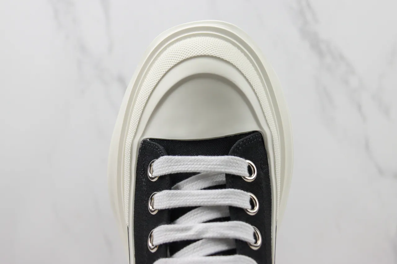 Alexander McQueen Zapatilla oversized negra lona suela blanca botas de tobillo 6