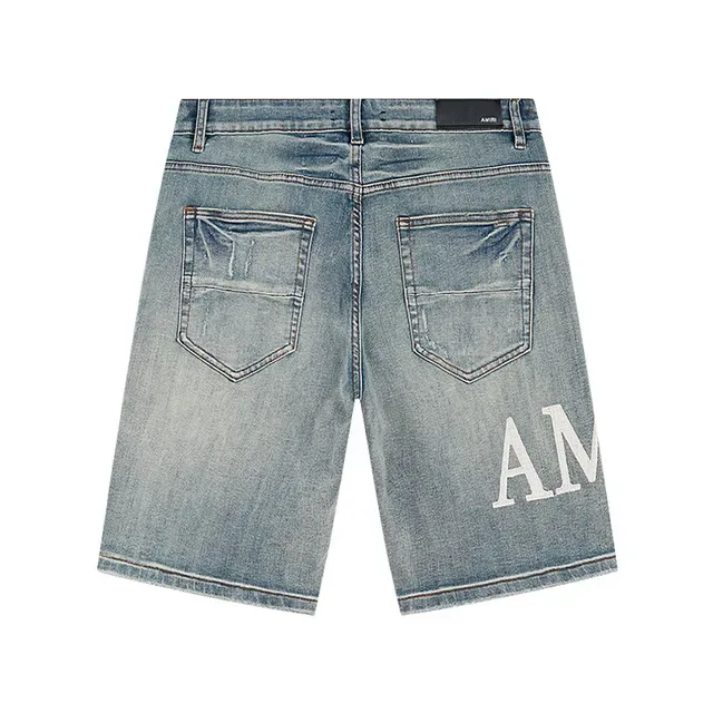 Amiri Logo-Print Distressed Light-Wash Denim Shorts 3