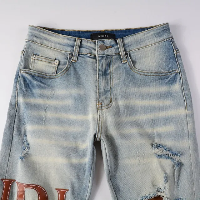 Amiri Logo Print Distressed Skinny Jeans 4
