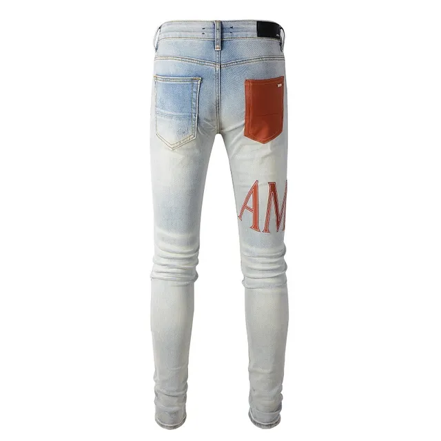 Amiri Logo Print Distressed Skinny Jeans 5
