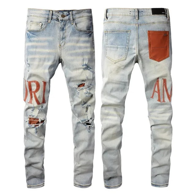 Amiri Logo Print Distressed Skinny Jeans 8