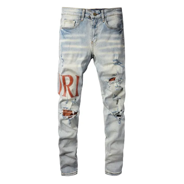 Amiri Logo Print Distressed Skinny Jeans 10