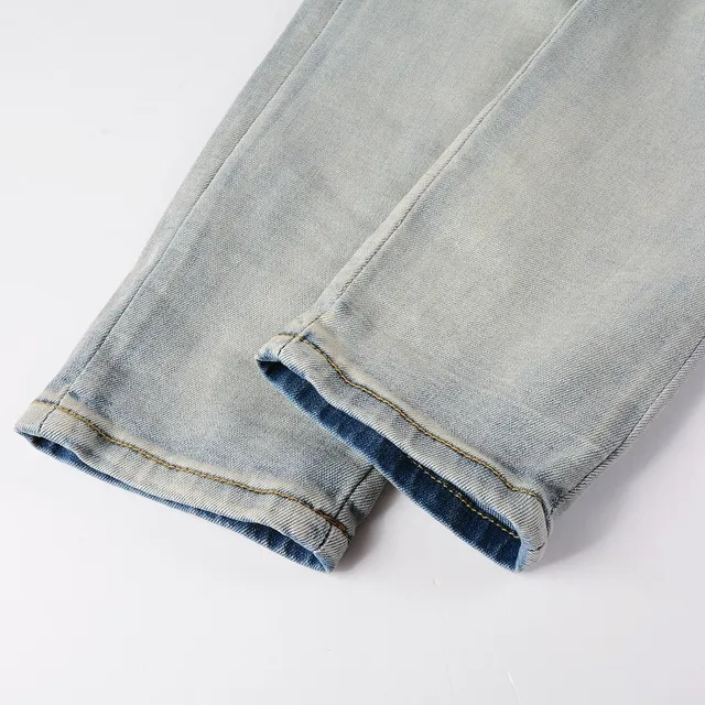 Amiri Logo Print Distressed Skinny Jeans 11