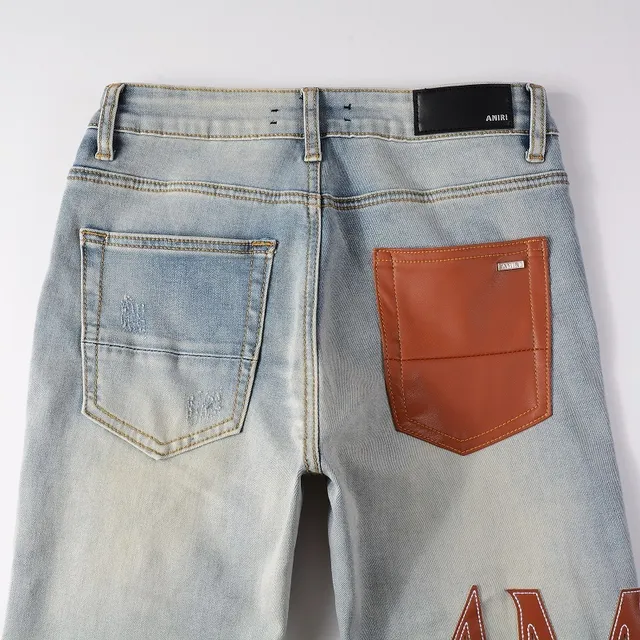 Amiri Logo Print Distressed Skinny Jeans 14