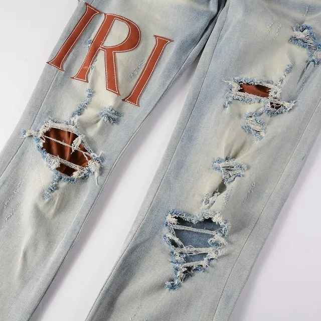 Amiri Logo Print Distressed Skinny Jeans 15