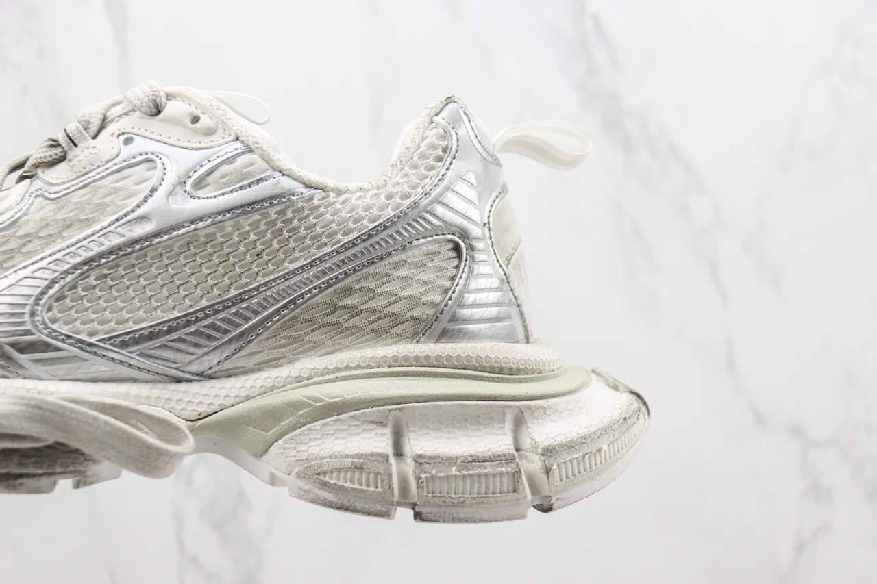 Balenciaga Sneakers Chunky avec semelle blanche et argentée, maille stratifiée et synthétique métallique 7