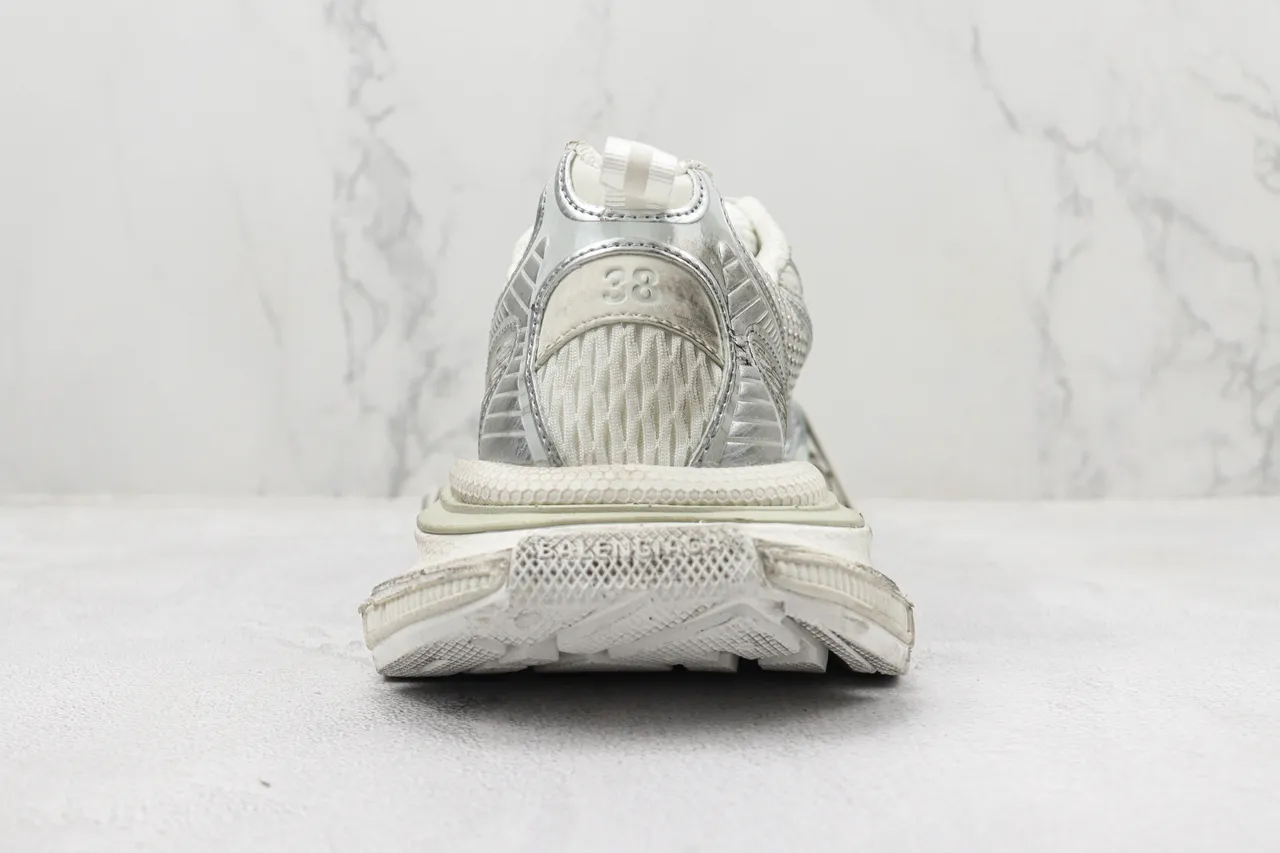 Balenciaga Sneakers Chunky avec semelle blanche et argentée, maille stratifiée et synthétique métallique 9