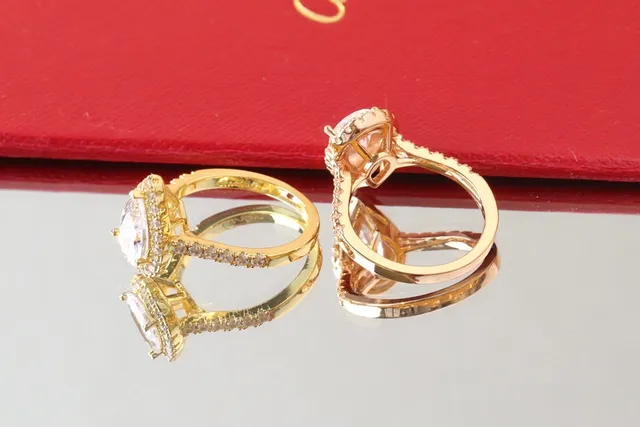 Cartier Pear-Cut Diamond Halo Pavé Ring 4