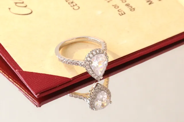 Cartier Pear-Cut Diamond Halo Pavé Ring 5