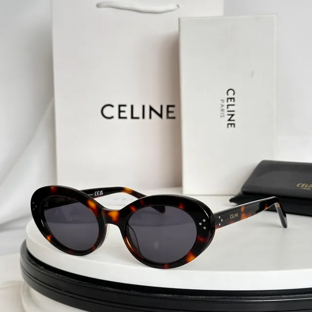 Celine Lunettes de soleil noir marron cadre ovalé acétate construction 5