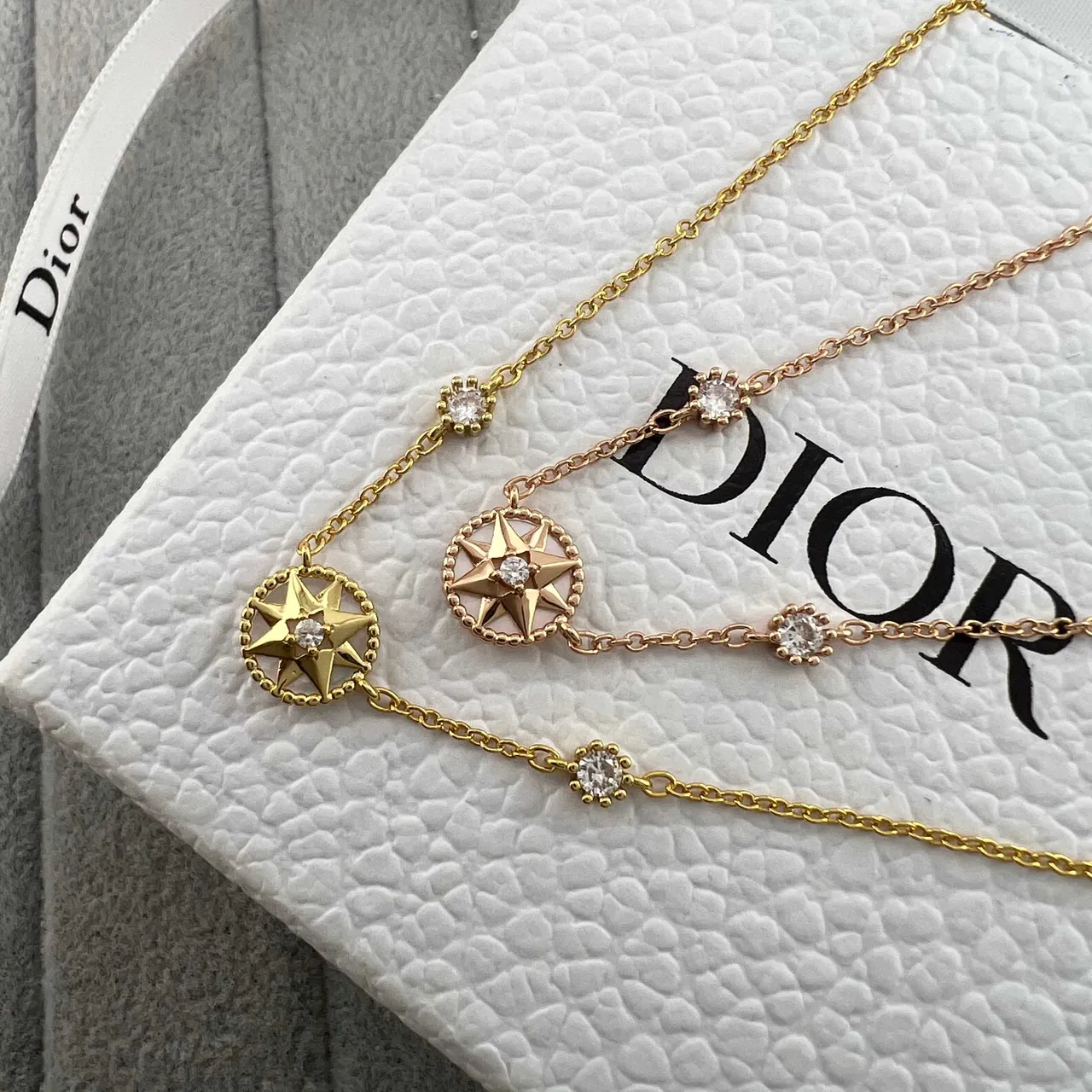Dior Rose des Vents Compass Star Gold-Tone و Rose Gold Crystal Bracelets 6