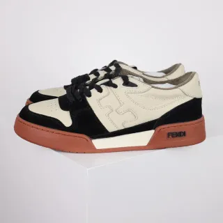 Fendi 米色黑色不对称面板构造奶油色皮革与麂皮对比生活方式运动鞋