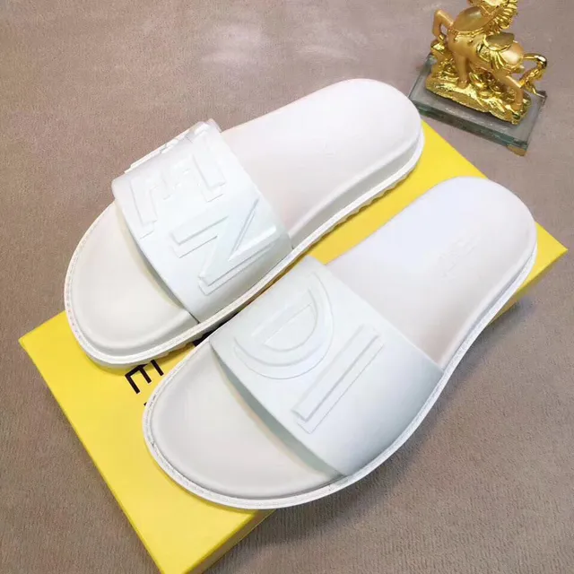 Fendi Ff Slide pantoufles en caoutchouc moulé blanches 3