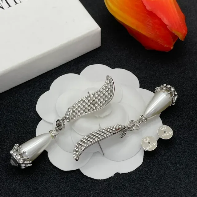 Crystal-Paved Wing and Teardrop Pearl Dangling Earrings 4