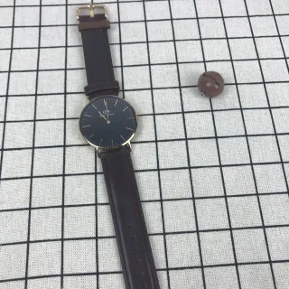 Daniel Wellington काला भूरा न्यूनतम पतला केस क्वार्ट्ज घड़ी