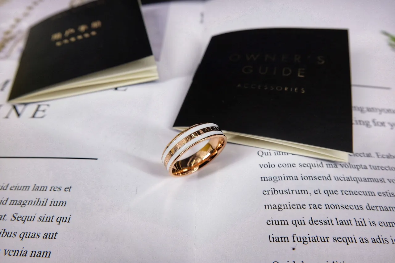 Daniel Wellington خاتم سيراميك كلاسيكي ذهبي وردي وأبيض 8