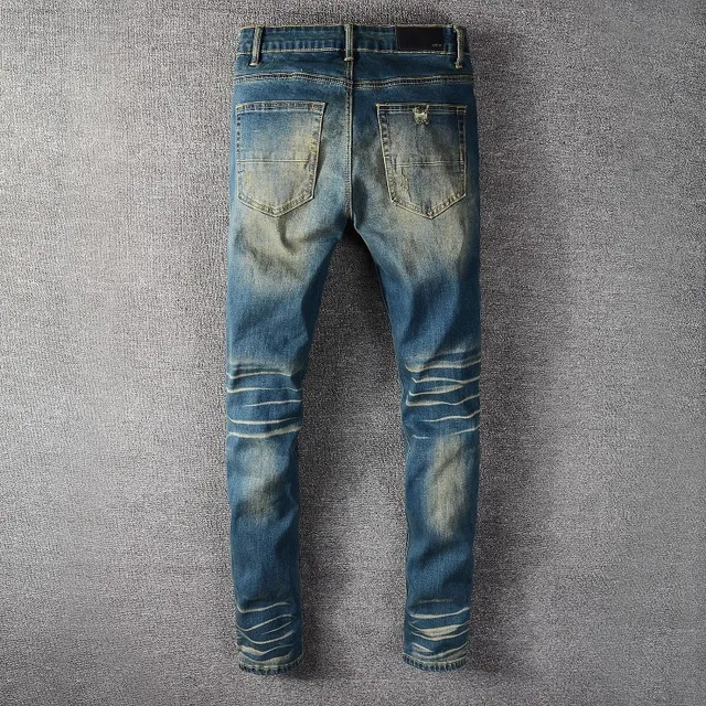 Jeans bleus slim-fit déchirés décolorés 3