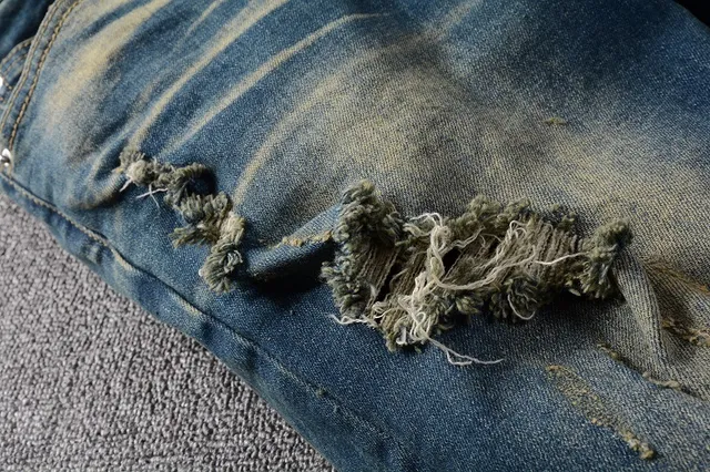 Jeans bleus slim-fit déchirés décolorés 4