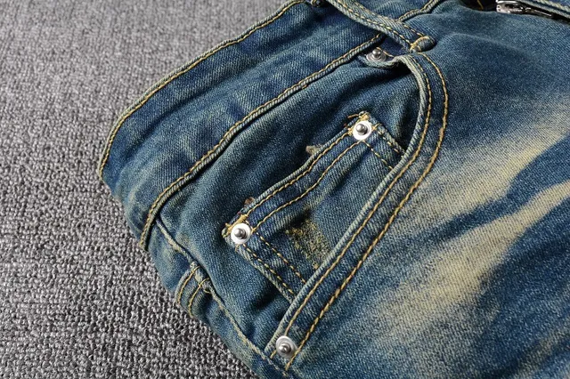 Jeans bleus slim-fit déchirés décolorés 5