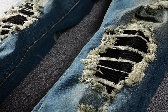 Jeans bleus slim-fit déchirés décolorés 7