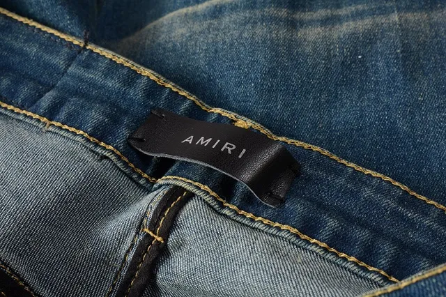 Jeans bleus slim-fit déchirés décolorés 13