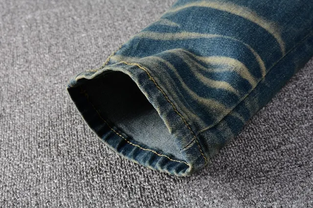 Jeans bleus slim-fit déchirés décolorés 14