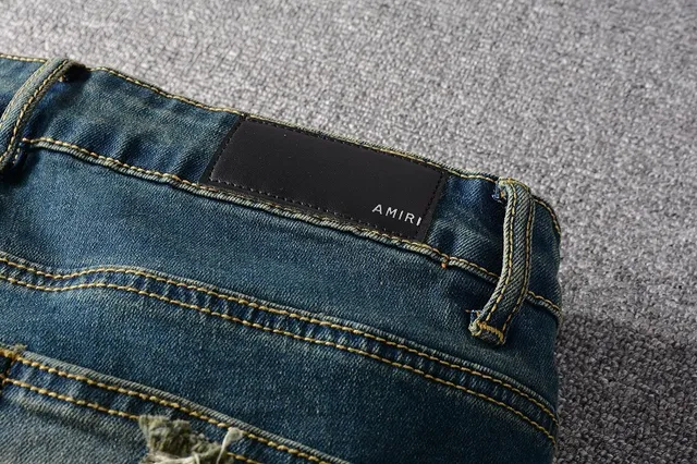 Jeans bleus slim-fit déchirés décolorés 15
