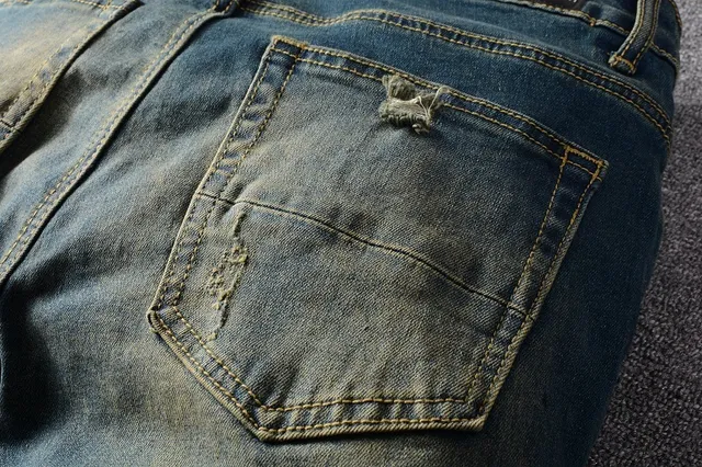 Jeans bleus slim-fit déchirés décolorés 16