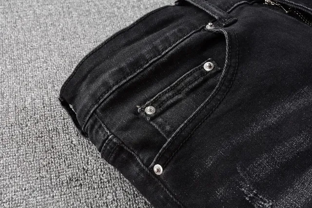 破损修身黑色牛仔裤 9