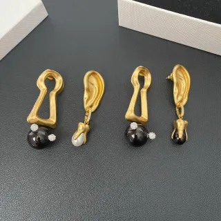 أقراط ذهب أسود نحتية شكلية غير متماثلة قطرة