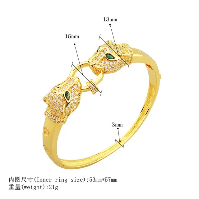 Bracelet en or avec motif tête de panthère verte pavé de cristaux clairs 2