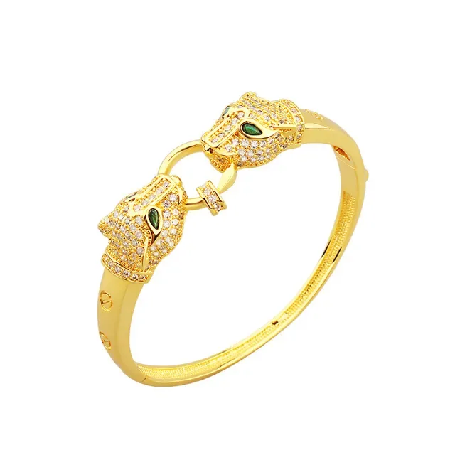 Bracelet en or avec motif tête de panthère verte pavé de cristaux clairs 3