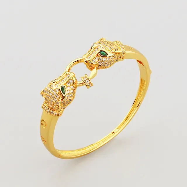 Bracelet en or avec motif tête de panthère verte pavé de cristaux clairs 6