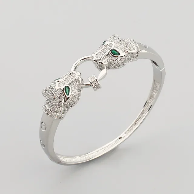 Bracelet en or avec motif tête de panthère verte pavé de cristaux clairs 7