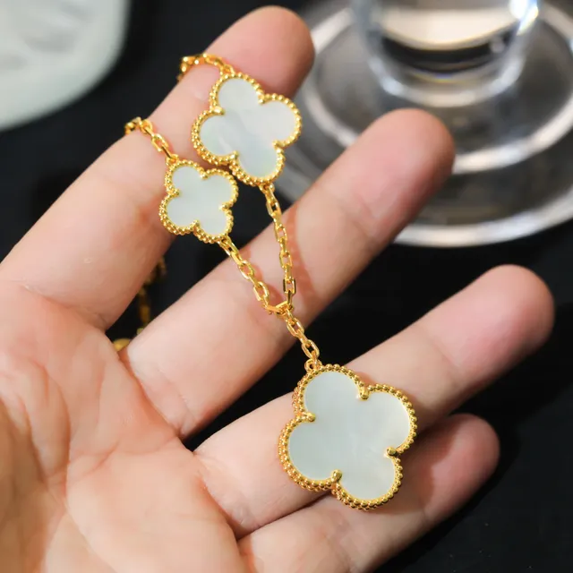 Gold-Tone Five Clover Charm Bracelet 7