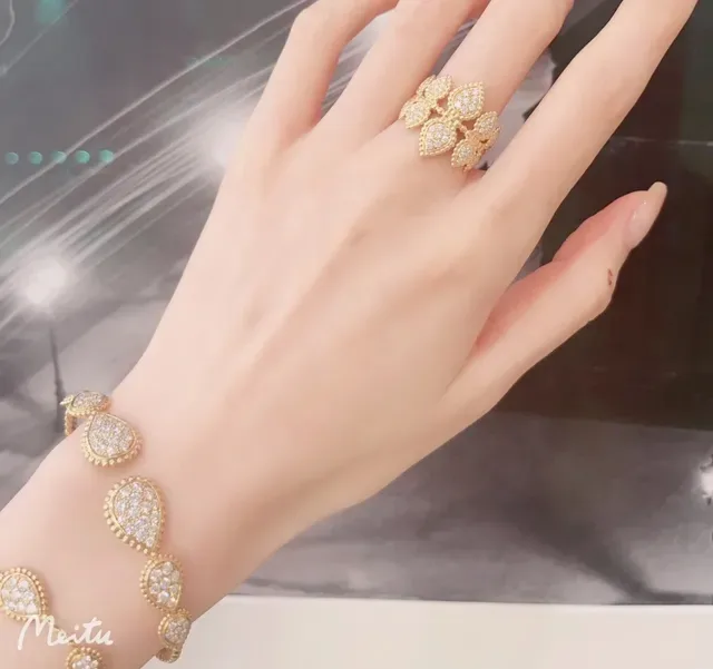 سوار ذات حلقات ذهبي اللون بباڤيه وشكل قطرة 8