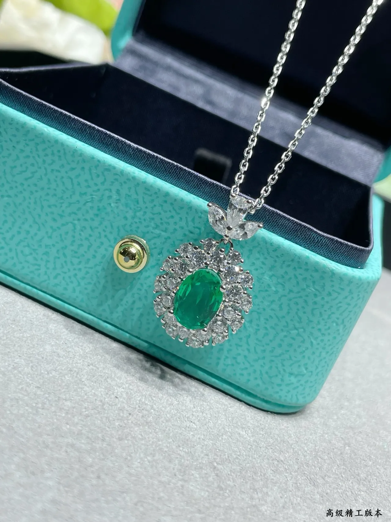 Oval Emerald and Diamond Halo Pendant Necklace 4