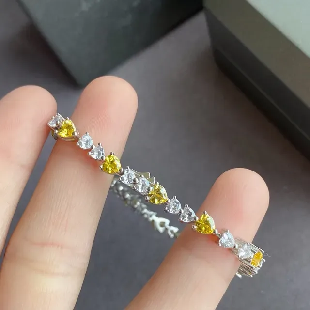 Pulseira tono plateado pedra coração amarelo e transparente alternante 2