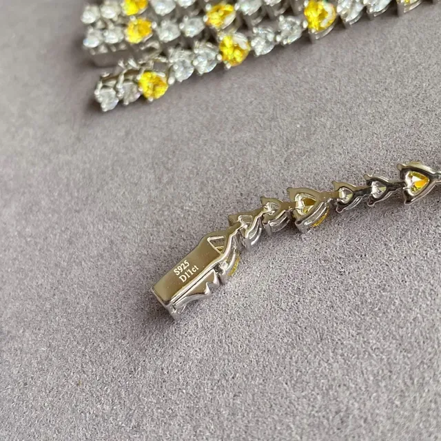 Pulseira tono plateado pedra coração amarelo e transparente alternante 4