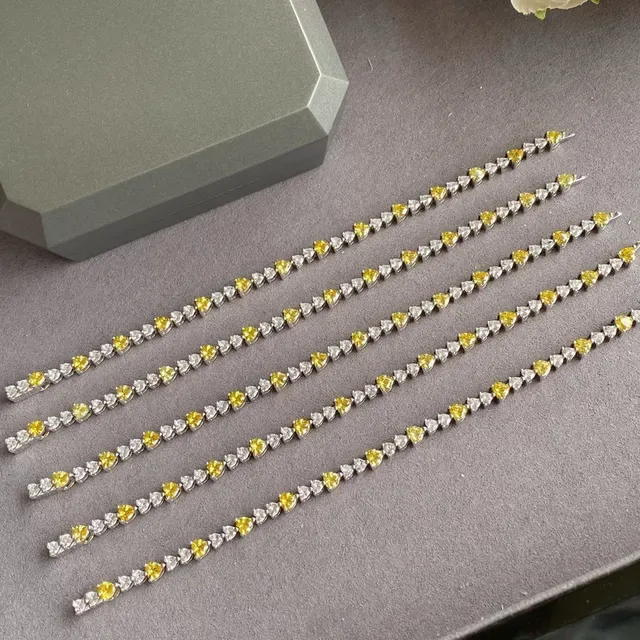 Pulseira tono plateado pedra coração amarelo e transparente alternante 5