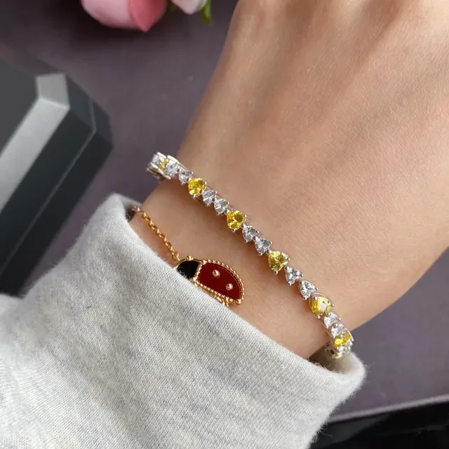 Pulseira tono plateado pedra coração amarelo e transparente alternante 7