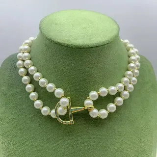Collier de perles cultivées en or blanc à double chaîne