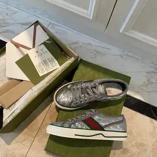 Gucci Ace Zapatillas lifestyle con rayas web y brillo